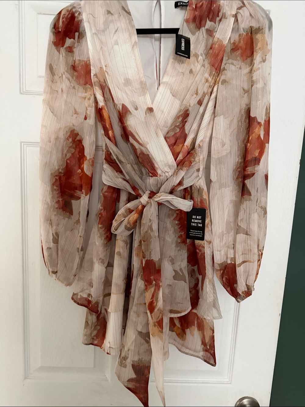 Express floral romper with tie waist and gold detailing